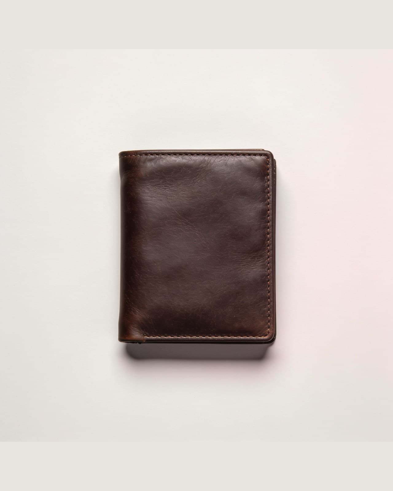 Peglio Leather Wallet · Dark brown